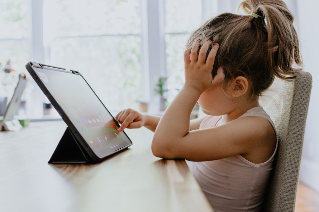 Young student in an online learning class on a tablet