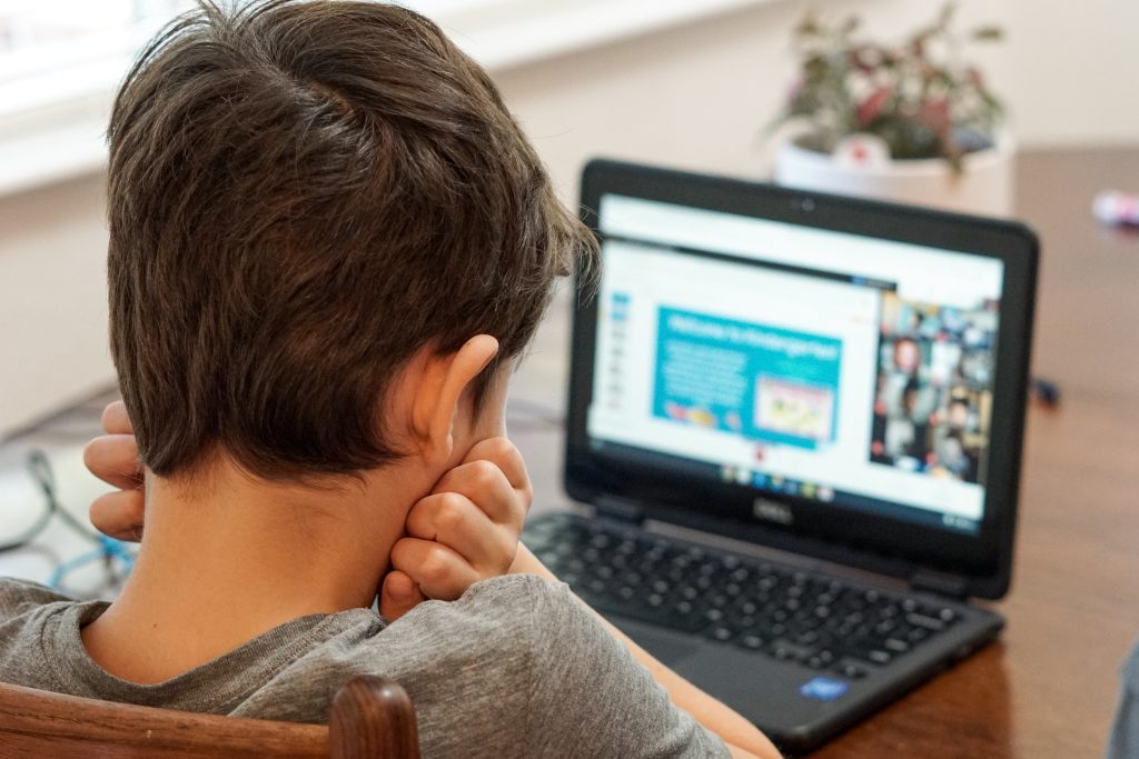 young student in a virtual classroom session