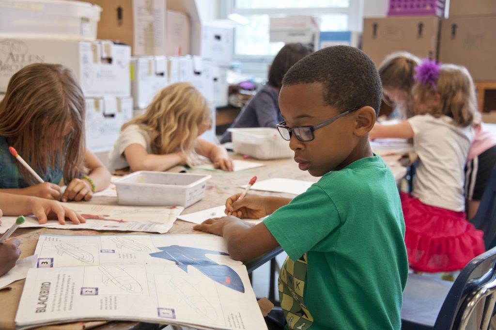 group of young students in a classroom